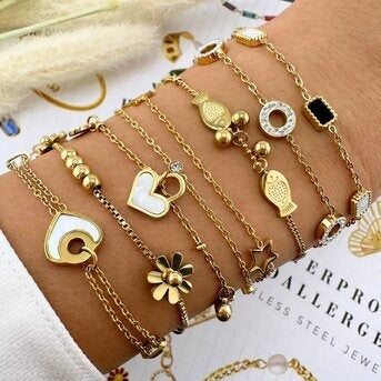 Pulseira "Coraçõezinhos", Aço banhado a ouro 18K