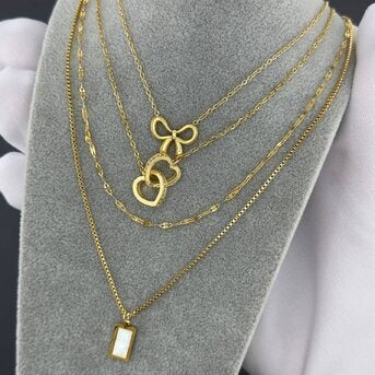 Colar "Coraçõezinhos", Aço banhado a ouro 18K